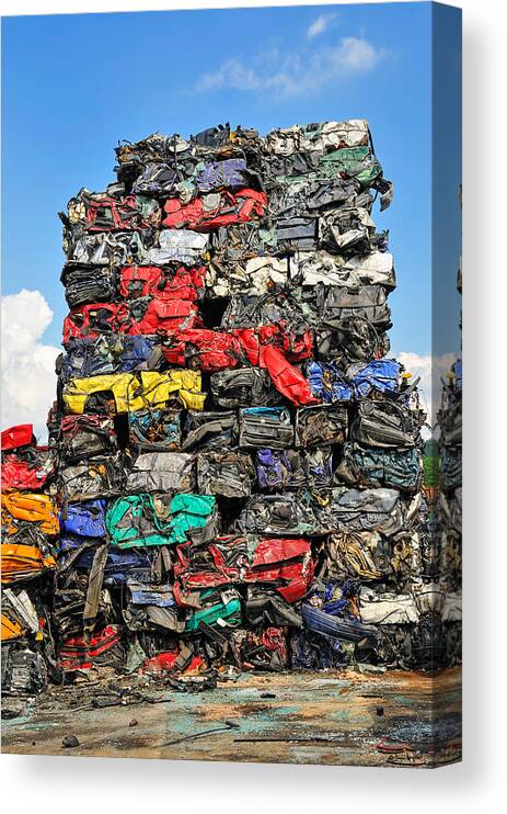 Scrap Cars Canvas Print featuring the photograph Pile of scrap cars on a wrecking yard by Matthias Hauser