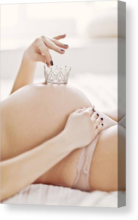 Skin Canvas Print featuring the photograph Pregnant woman holding a crown on belly by With love of photography