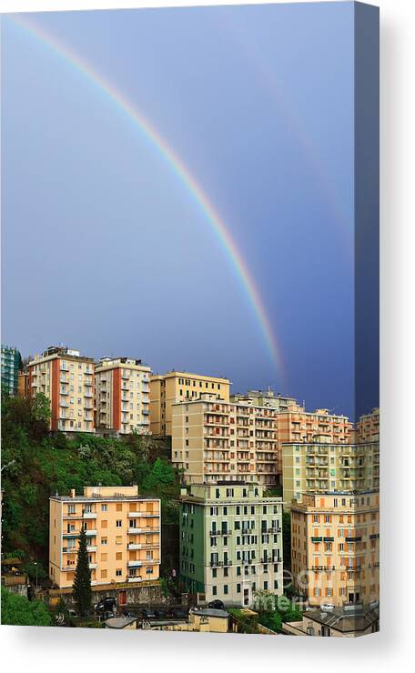 Arc Canvas Print featuring the photograph Rainbow Over The Town by Antonio Scarpi