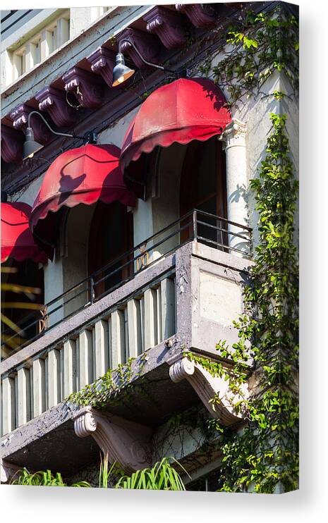 1924 Canvas Print featuring the photograph Red Awnings at the Van Dyke by Ed Gleichman