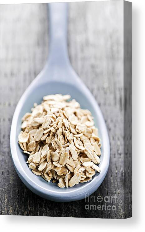 Oats Canvas Print featuring the photograph Rolled oats by Elena Elisseeva