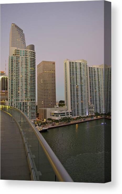 Tranquility Canvas Print featuring the photograph Rooftop View Of Waterway And Apartment by Barry Winiker