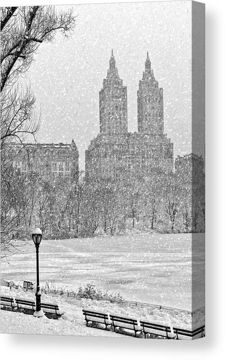 Central Park Canvas Print featuring the photograph San Remo Towers Snow by Susan Candelario