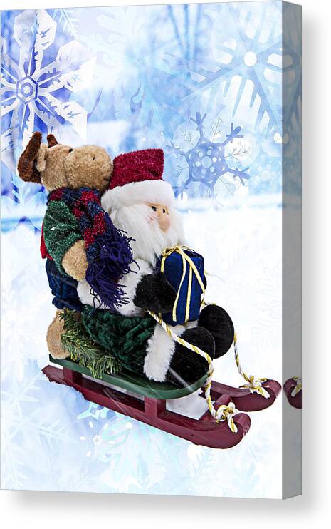 Snow Canvas Print featuring the photograph Seasonal Sleigh Ride by Bill and Linda Tiepelman