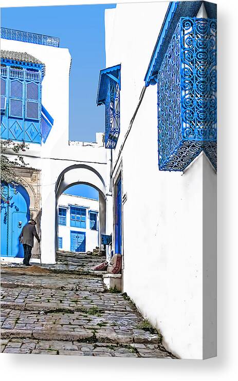 Arabic Canvas Print featuring the photograph Old Man on Stairs by Maria Coulson
