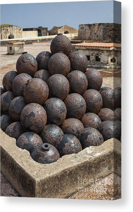 Artillery Canvas Print featuring the photograph Stack Of Cannon Balls At Castillo San Felipe Del Morro by Bryan Mullennix