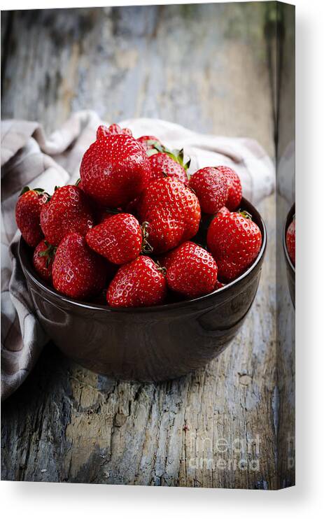Strawberry Canvas Print featuring the photograph Strawberries on wooden table by Jelena Jovanovic