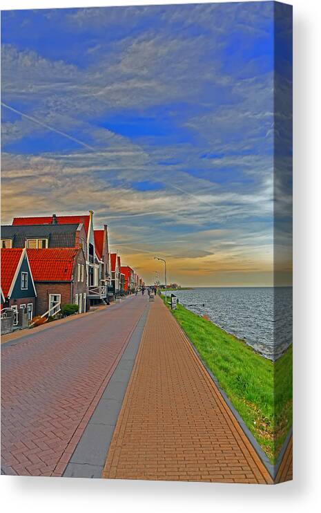 Travel Canvas Print featuring the photograph Sunset Over Volendam by Elvis Vaughn