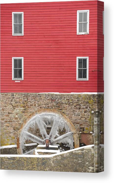 Mill Canvas Print featuring the photograph The Frozen Wheel by Mark Rogers