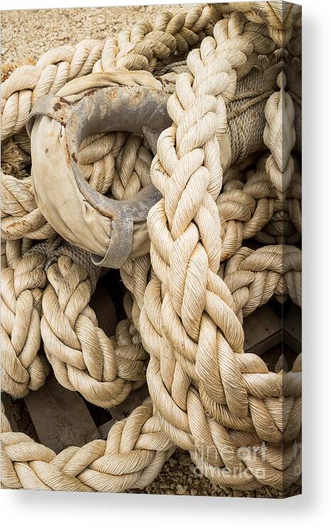 Braided Canvas Print featuring the photograph Braided rope with eyelet by Imagery by Charly
