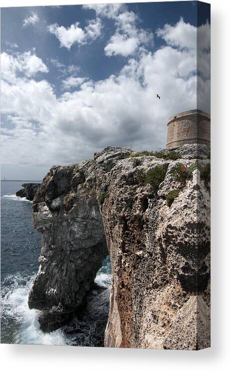 Architecture Canvas Print featuring the photograph Stunning tower over the cliffs of Alcafar in MInorca island - Tower and sea by Pedro Cardona Llambias