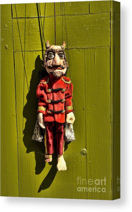 Prague Canvas Print featuring the photograph Traditional Puppet in Prague by Brenda Kean