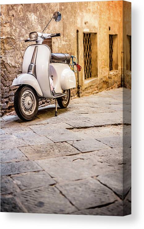 Land Vehicle Canvas Print featuring the photograph Vespa Scooter In Old Italian Alley by Giorgiomagini