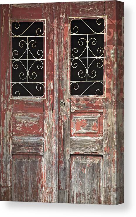 Artistic Canvas Print featuring the photograph Weathered Red Wood Rustic Door with Peeling Paint by David Letts
