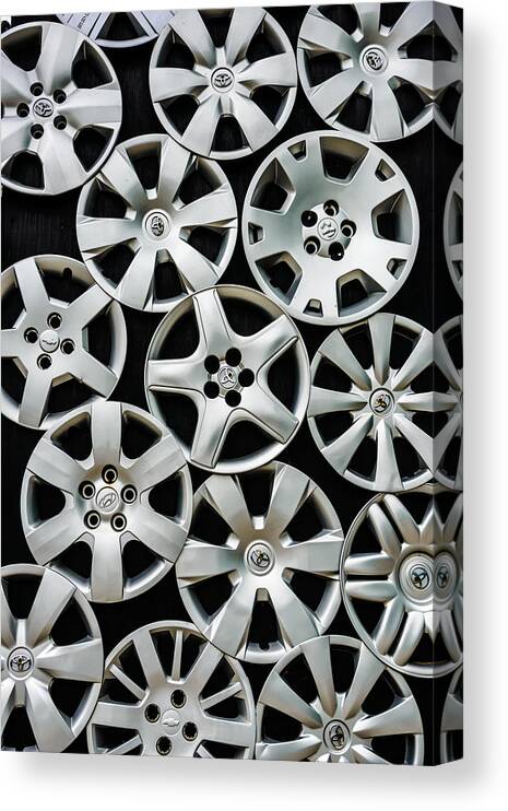 Hub Caps Canvas Print featuring the photograph Wheel of Fortune by Louis Dallara