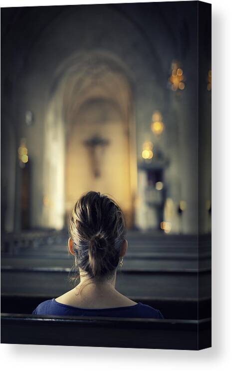 Pew Canvas Print featuring the photograph Woman visiting a christian church by LordRunar