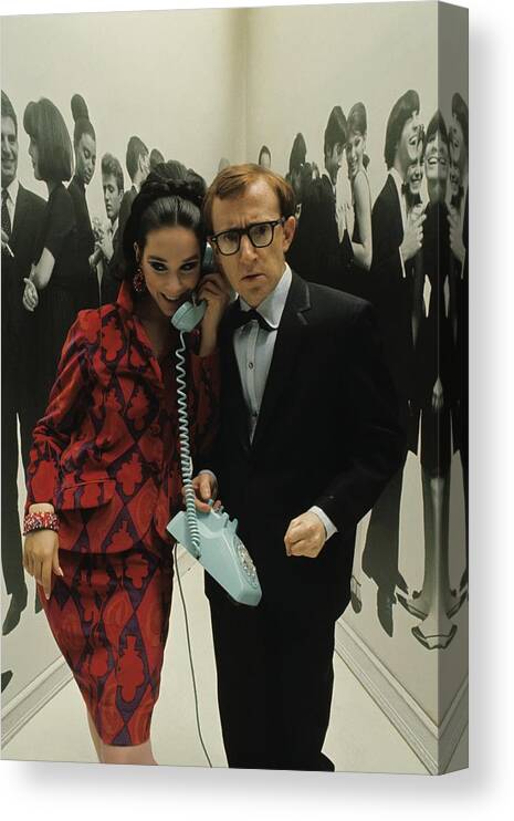 Actor Canvas Print featuring the photograph Woody Allen Posing With A Model Holding by David Mccabe