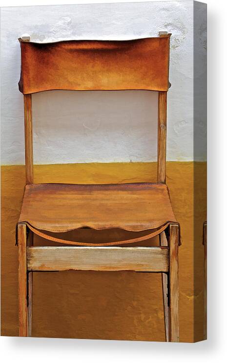 Artistic Canvas Print featuring the photograph Worn Leather Outdoor Cafe Chair by David Letts