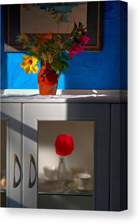 Yellow Flower Canvas Print featuring the photograph Yellow flower in a vase of clay. by Juan Carlos Ferro Duque