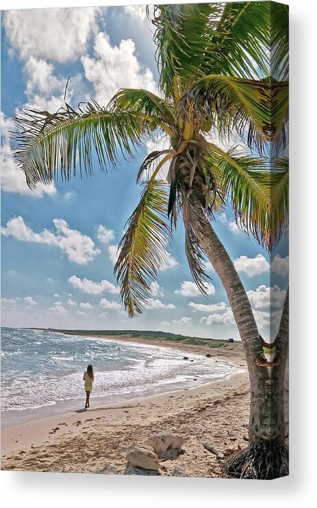 Water's Edge Canvas Print featuring the photograph Young Lady Walking The Beach At Cozumel by Ronnie Wiggin