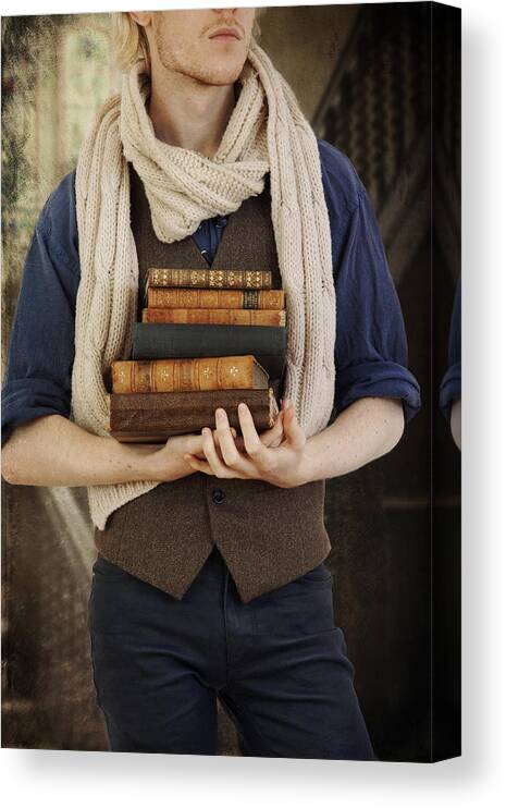 Man Canvas Print featuring the photograph Vintage Young Man Carrying Books And Wearing A Scarf by Ethiriel Photography