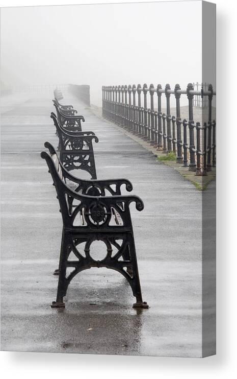 Bench Canvas Print featuring the photograph Redcar, North Yorkshire, England Row Of #1 by John Short