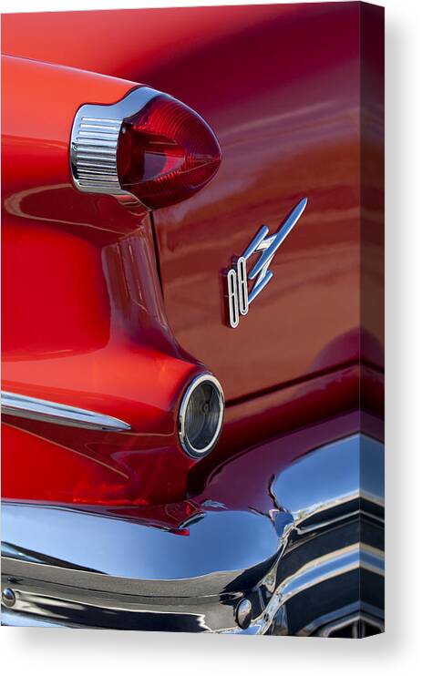 1956 Oldsmobile 88 Canvas Print featuring the photograph 1956 Oldsmobile 88 Taillight Emblem by Jill Reger