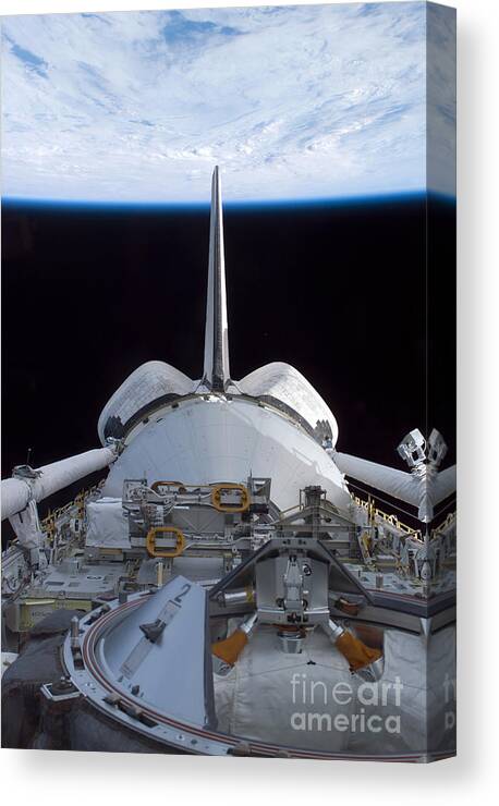 Astronomy Canvas Print featuring the photograph Space Shuttle Discovery #9 by Nasa