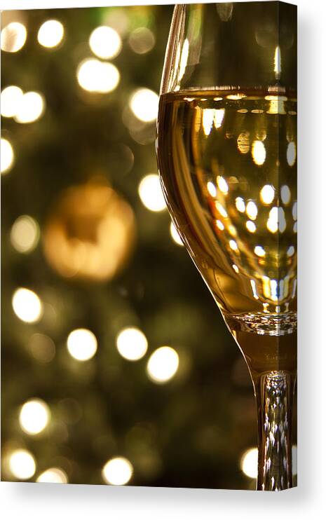 Christmas Canvas Print featuring the photograph A Drink by the Tree by Andrew Soundarajan