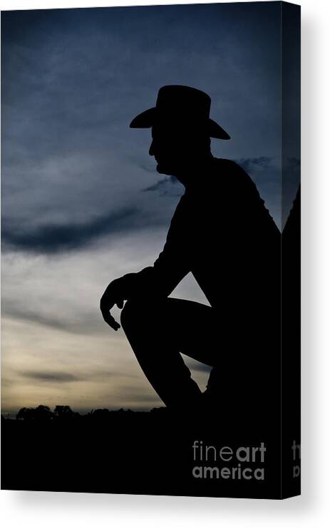 Cowboy Silhouette Canvas Print featuring the photograph Cowboy silhouette at sunset by Andre Babiak