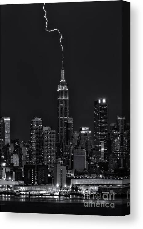 Clarence Holmes Canvas Print featuring the photograph Empire State Building Lightning Strike II by Clarence Holmes