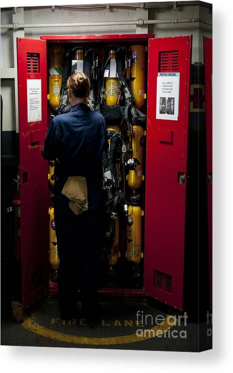Breathing Apparatus Canvas Print featuring the photograph Fireman Stows A Self-contained by Stocktrek Images