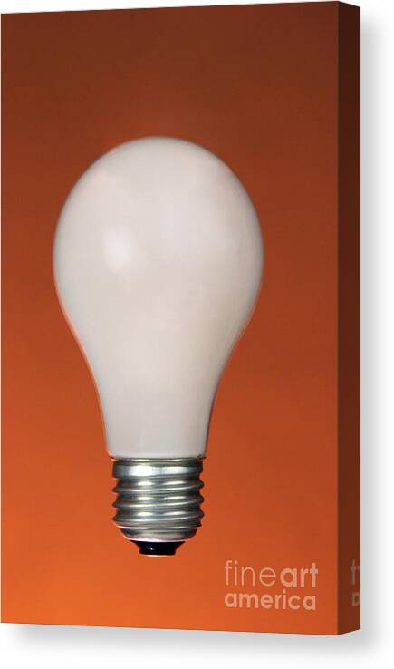 Object Canvas Print featuring the photograph Incandescent Light Bulb by Photo Researchers, Inc.