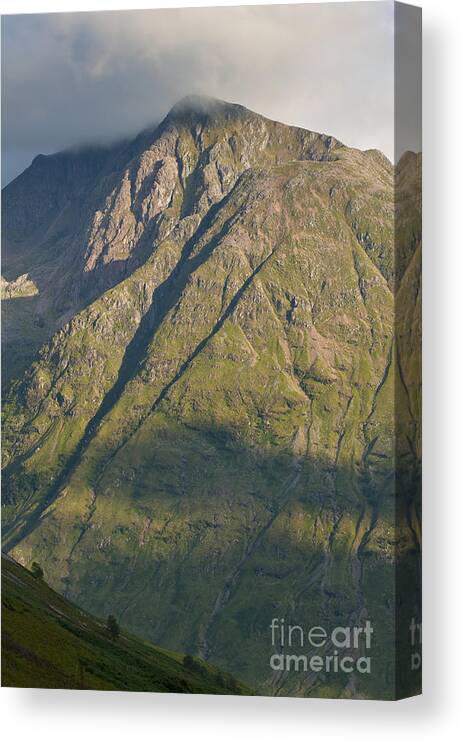 Britain Canvas Print featuring the photograph Mountain peaks at Glencoe by Andrew Michael