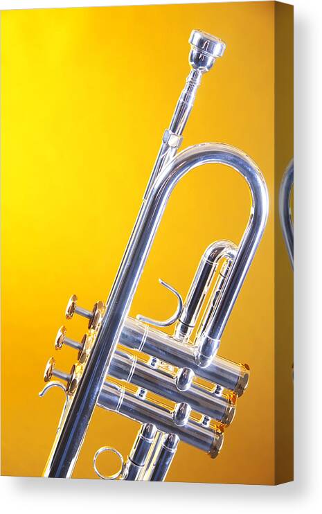 Trumpet Canvas Print featuring the photograph Silver Trumpet Isolated On Yellow by M K Miller