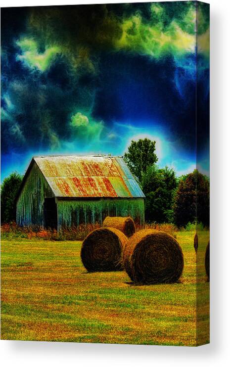 Barn Canvas Print featuring the photograph Spooky Hay Field by Bill and Linda Tiepelman