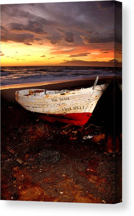 Spanish Canvas Print featuring the photograph Sunset on the beach by Perry Van Munster
