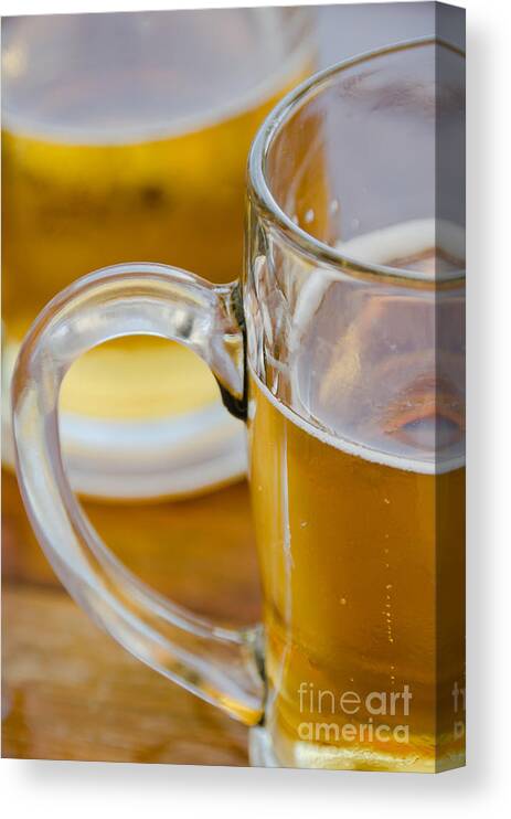 Beer Canvas Print featuring the photograph Two glasses of Beer by Yurix Sardinelly