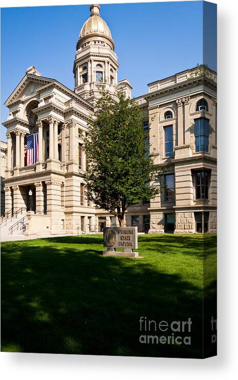 American Flag Canvas Print featuring the photograph Wyoming State Capital by Lawrence Burry