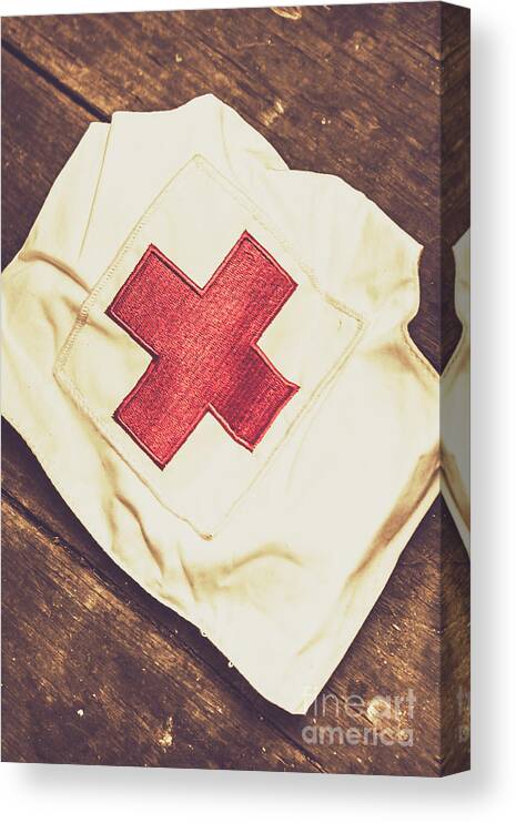 Hospital Canvas Print featuring the photograph Antique nurses hat with red cross emblem by Jorgo Photography