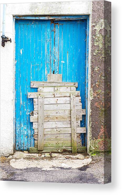 Abandoned Canvas Print featuring the photograph Boarded up door #1 by Tom Gowanlock