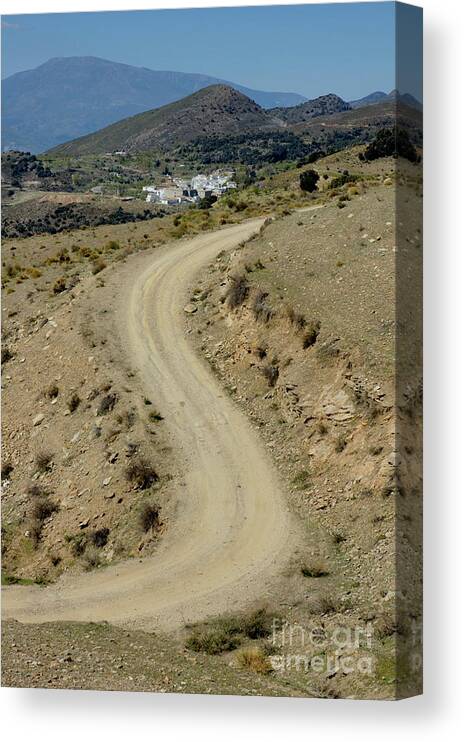 Alpujarra Canvas Print featuring the photograph Dirt road winding #1 by Sami Sarkis