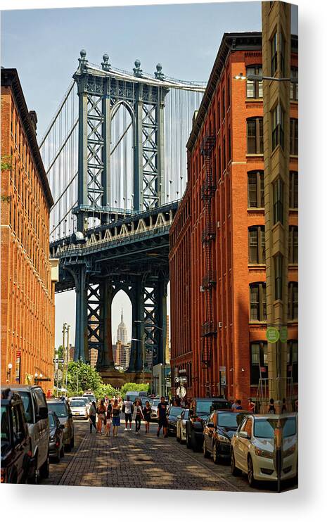 Manhattan Canvas Print featuring the photograph Empire State Building under Manhattan Bridge by Doolittle Photography and Art