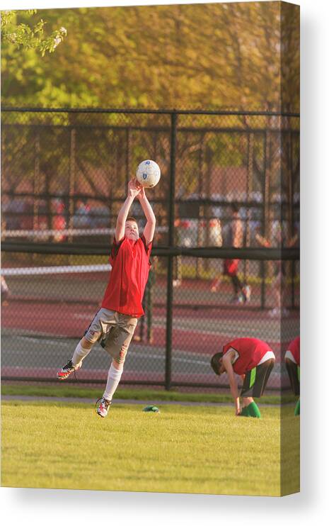 Active Canvas Print featuring the photograph Youth Soccer Practice #1 by Peter Lakomy