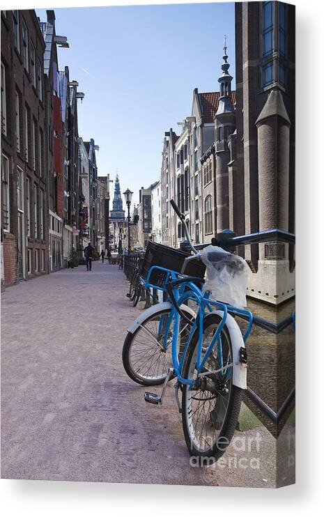 Age Canvas Print featuring the photograph Streets of Amsterdam #11 by Andre Goncalves