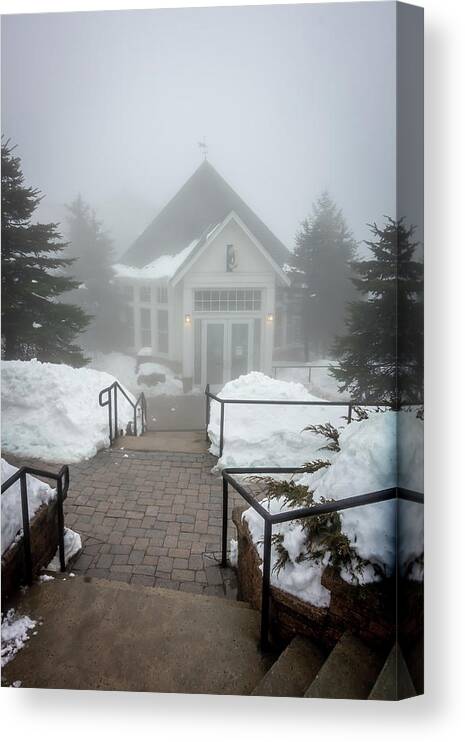 Foggy Canvas Print featuring the photograph Beautiful street of american town village in mountains in winter #3 by Alex Grichenko