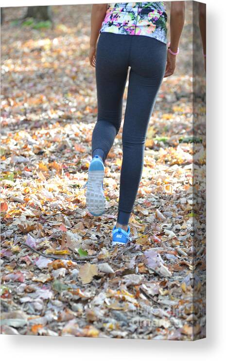 Ally Canvas Print featuring the photograph Jogging in the fall #4 by Dan Friend