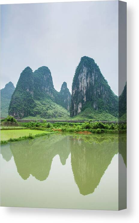 Landscape Canvas Print featuring the photograph The beautiful karst rural scenery in spring #50 by Carl Ning