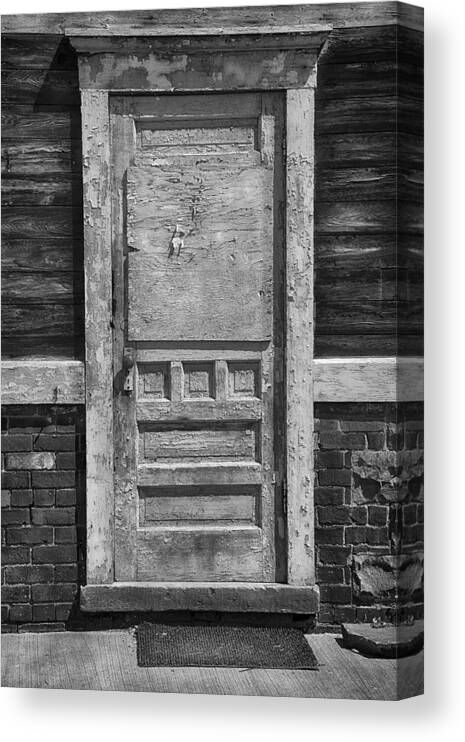 Door Canvas Print featuring the photograph A Well Used Door by Dick Pratt