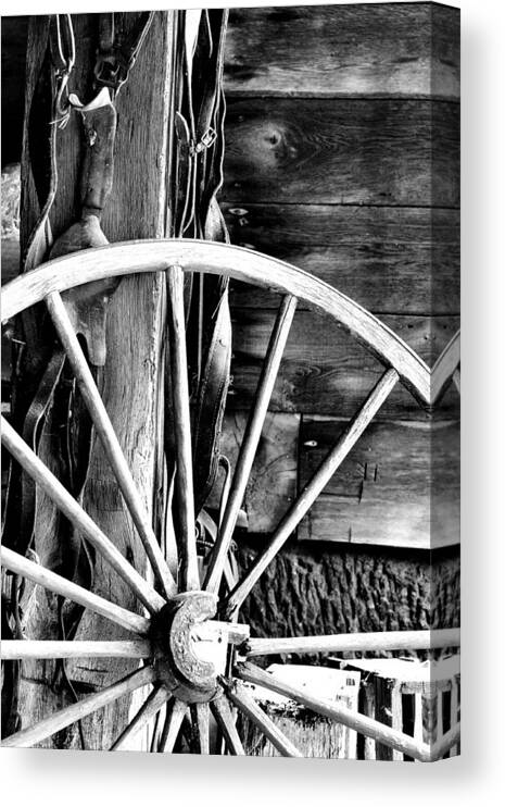 Black And White Canvas Print featuring the photograph Antique Wagon Wheel by Michelle Joseph-Long